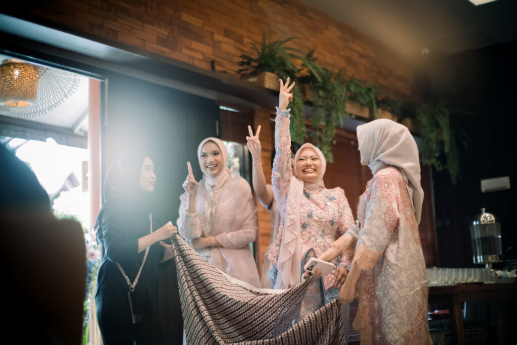 The Engagement of Syifani & Rizky at Telaga Sampireun - Wedding by Emaara